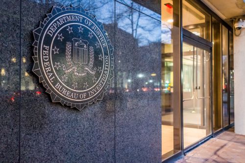 FBI Seal at headquarters - warrantless searches at the FBI concept