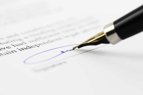 Toned signature. Federal Plea Agreement Concept.