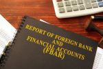 Book with title Report of Foreign Bank and Financial Accounts (FBAR). FBAR Concept