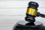 Close up of Lawyer's gavel. Laws and regulation concept.